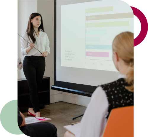 Diverse team collaborating during their new manager training UK program, applying lessons to prevent organizational dysfunctions