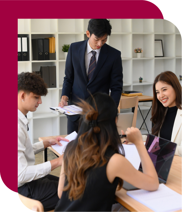 A team in discussion — conversations happening earlier and more effectively after management development