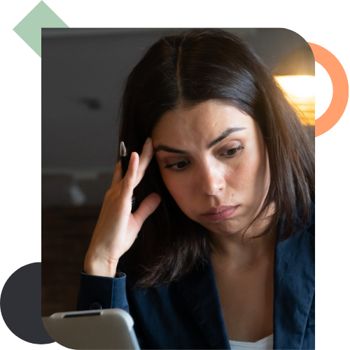 A concerned professional looking at her phone with a hand to her head, representing the stress and escalating issues caused by a lack of honest communication in a team.